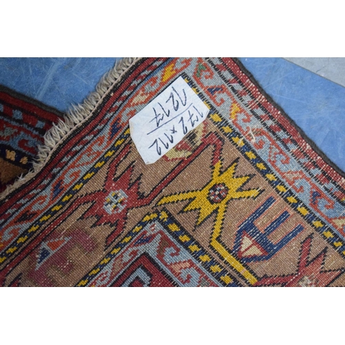 80 - An Antique Hand-Made Kazak Rug, 172 x 112cms