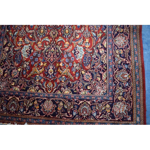 83 - An Antique Persian Hand-Made Keshan Rug, 205 x 130cms