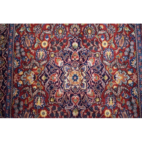 83 - An Antique Persian Hand-Made Keshan Rug, 205 x 130cms