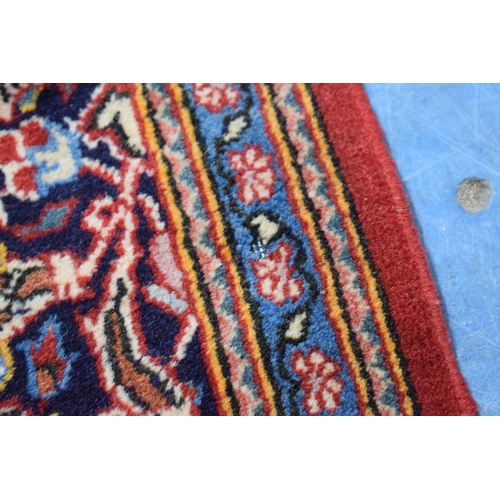 83 - An Antique Persian Hand-Made Keshan Rug, 205 x 130cms