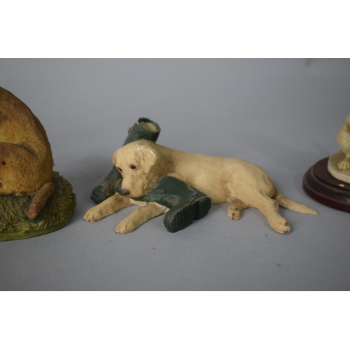 256 - A Collection of Five Resin Labrador Ornaments to Feature Arista Designs Ltd and Board Fine Arts