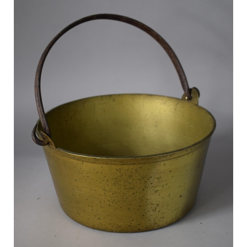99 - A Heavy Brass Jam Pan with Iron Loop Handle, 33cms Diameter