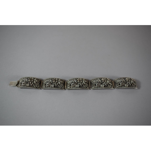 204 - A Five Segment Silver Bracelet with Intricate Pierced Relief Floral Decoration, Stamped 'Silver', 42... 