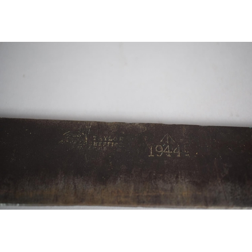 34 - A Military Machete with Wooden Handle by Taylor of Sheffield, Stamped with War Dept, Crow's Foot and... 