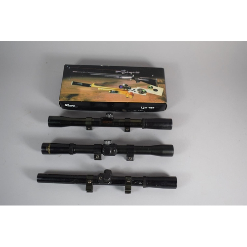 32 - Two Crossman Air Rifle Scopes, a Simmons Scope and a Sharp Laser Scope
