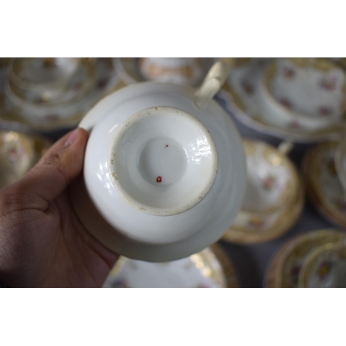 268 - A 19th Century Yellow Batwing Tea Set Comprising Eight Cups, Eleven Saucers, Seven Side Plates, Milk... 