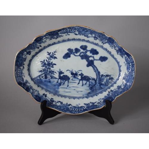 262 - An Early Chinese Export Oval Platter with Deer and Landscape Decoration (Hairline Crack), 33cms Wide