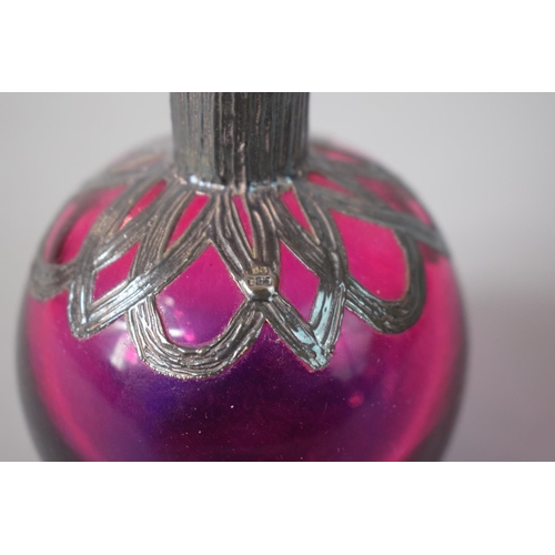 186 - A Silver Mounted Cranberry Glass Perfume Bottle, 12cms High