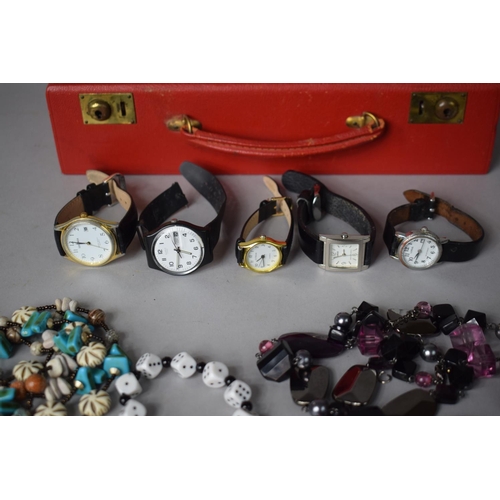 237 - A Fitted Red Leather Jewellery Case Containing Costume Jewellery, Ladies Wrist Watches Etc.