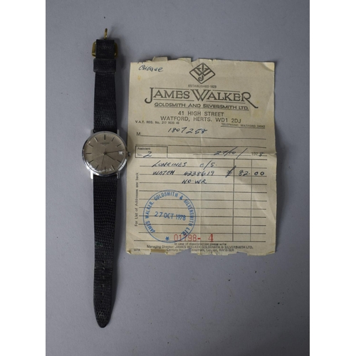 230 - A 1970's Longines Wrist Watch with Silvered Dials, Battens and Subsidiary Calendar Dial, No. 522371 ... 