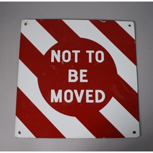 64 - An Enamelled Double Sided Warning Sign, 'Not To Be Moved', 30.5 x 30.5cms