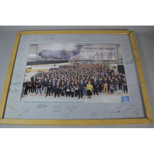 443 - A Signed and Mounted Photograph Commemorating The A400M Team Celebrating its Maiden Flight in the Wi... 