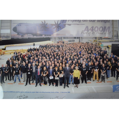 443 - A Signed and Mounted Photograph Commemorating The A400M Team Celebrating its Maiden Flight in the Wi... 