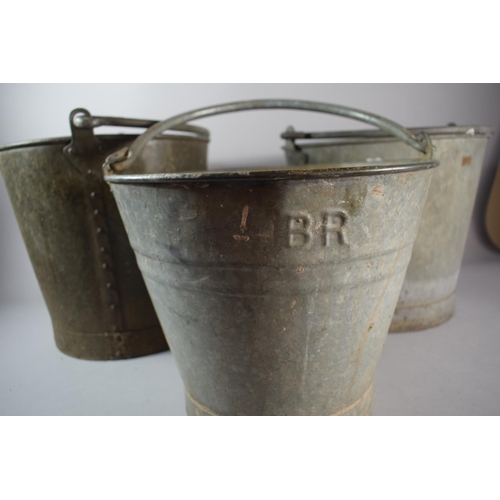 114 - A Collection of Three Galvanised Fire Buckets with Iron Loop Carrying Handles, One Marked for Britis... 