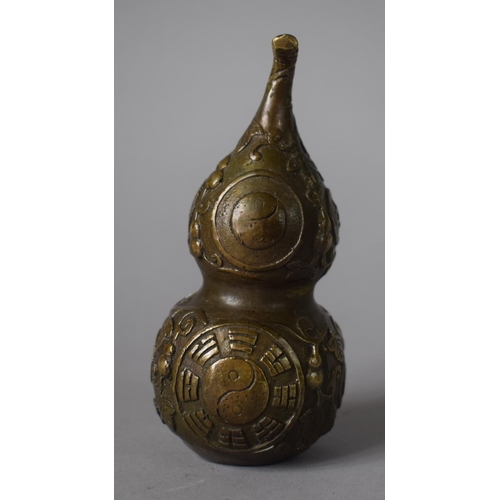 226 - A Chinese Cast Bronze Study of a Double Gourd Decorated in Relief with Scrolls, Vines,Character Mark... 