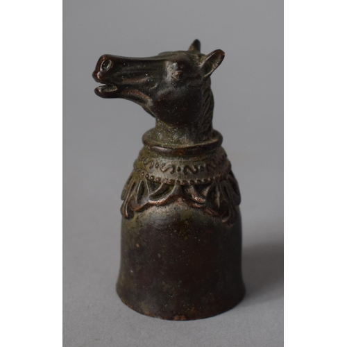 224 - A Small Bronze Candle Snuff with Horse Head Finial, 5.5cms High