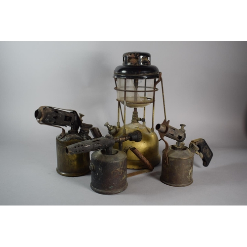 119 - A Vintage Hurricane Lamp and Three Blow Torches