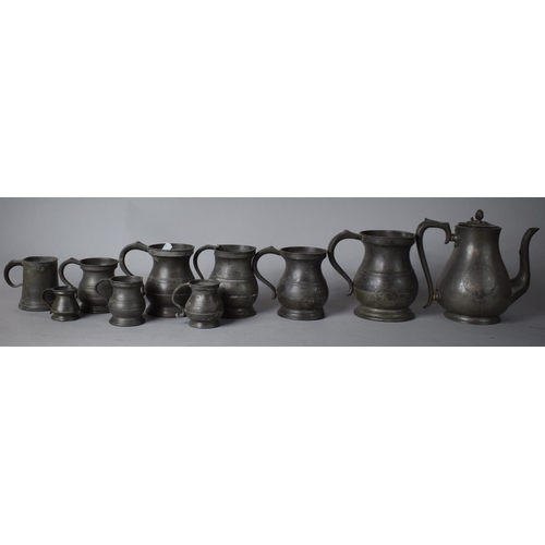 110 - A Collection of 19th Century Pewter Measures and a Teapot