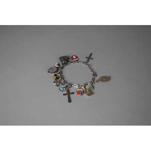 211 - A Small Silver Charm Bracelet with Enamelled Souvenir Shield Charms Etc, 24gms