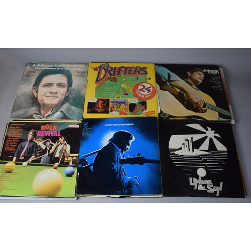 352 - A Collection of 31 LP's to Include Johnny Cash, ABBA, Bread, Eagles, Police Etc.