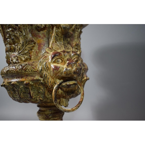61 - A Large and Elaborately Moulded Garden Urn having Lion Mask Handles and Scrolling Acanthus Decoratio... 
