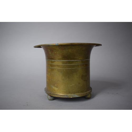 98 - A Trench Art Vase Formed from a Brass Shell Case, Set on Three Bun Feet, Stamped to Base, 14cms