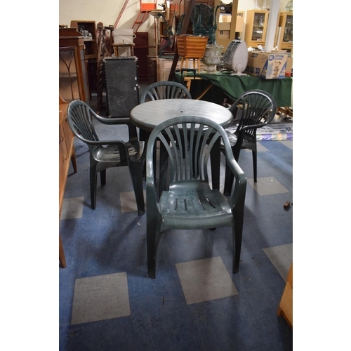 448 - A Plastic Garden/Patio Table and Chair Set