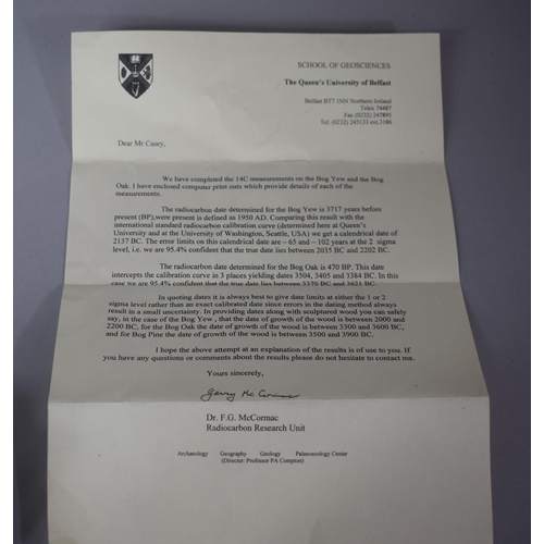 158 - An Irish Bog Yew Wood 'Cremabh Stone' Carving with Beeswax Finish Signed K. Casey 2006 Together with... 