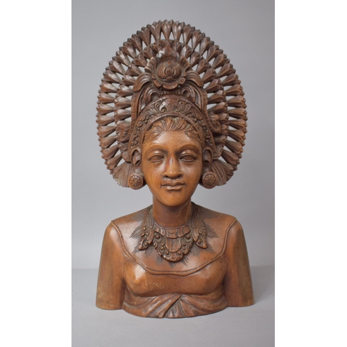 166 - A Balinese Carved Teak Bust of Goddess with Headdress, 35cm high