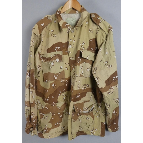 195 - A Collection of Various Military Camouflage Jackets and Trousers