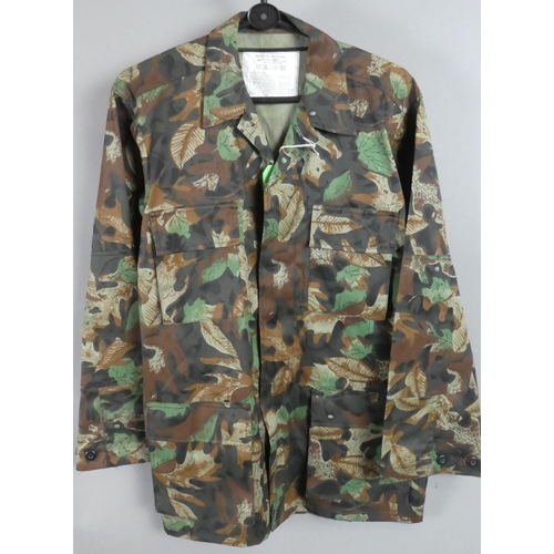 195 - A Collection of Various Military Camouflage Jackets and Trousers