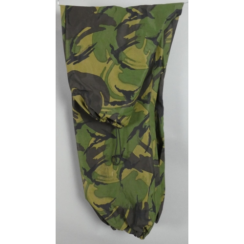 195 - A Collection of Various Military Camouflage Jackets and Trousers