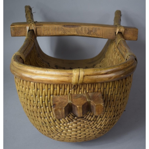 61 - An Oriental Wooden and Wicker Trug, 62cm Long