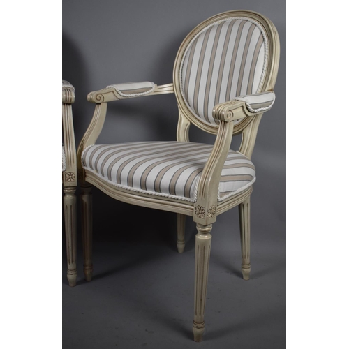 516 - A Pair of French Style Cream Painted Salon Armchairs with Serpentine Fronts and Striped Upholstery