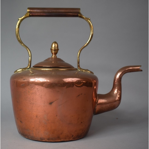 116 - A Copper Kettle with Acorn Final, 30cm high