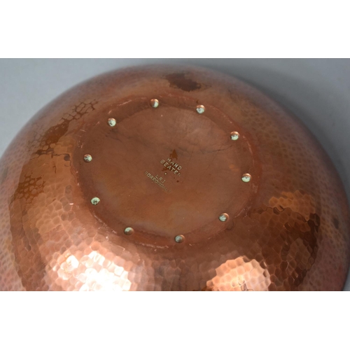 124 - A Beaten Copper Bowl, Stamped LRI, Borrowdale, 22cm Diameter