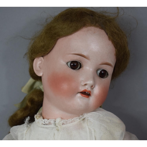 137 - A Late 19th/Early 20th Century German Porcelain Head Doll with Open Mouth and Closing Eye, Compositi... 