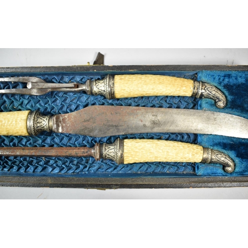 163 - A Late Victorian Cased Three Piece Bone Handled Carving Set and a Part Silver Plate Mounted Two Piec... 
