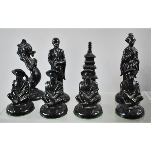 175 - A Full Set of Oriental Figural Chess Pieces, The Kings 9.25cm high