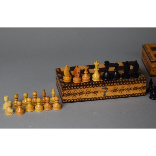 177 - Two Mid 20th Century Travelling Wooden Chess Sets in Pokerwork Decorated Boxes
