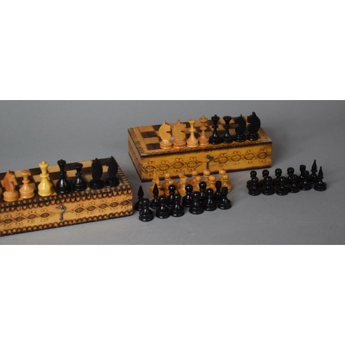 177 - Two Mid 20th Century Travelling Wooden Chess Sets in Pokerwork Decorated Boxes