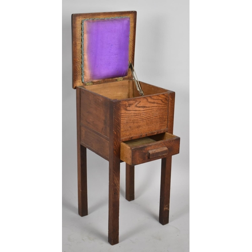 50 - An Edwardian Oak Lift Top Sewing Box on Stand, 33cm wide