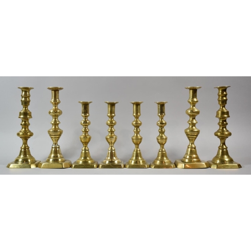 66 - Four Sets of Victorian Brass Candlesticks