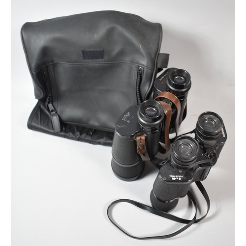 74 - Two Pairs of Binoculars and a Canvas Carrying Bag