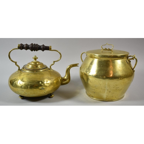 77 - A Brass Kettle with Turned Wooden Handle and a Lidded Brass Pot