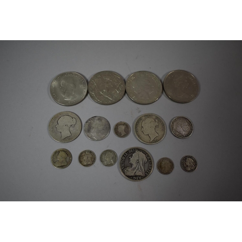 83 - A Collection of Ten Georgian and Victorian Silver Coins and Four QEII Crowns