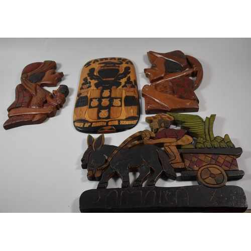 87 - Four Carved Jamaican Wooden Panels