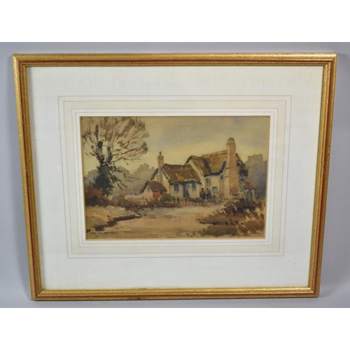 98 - A Framed Watercolour of a Cottage, 25cm wide