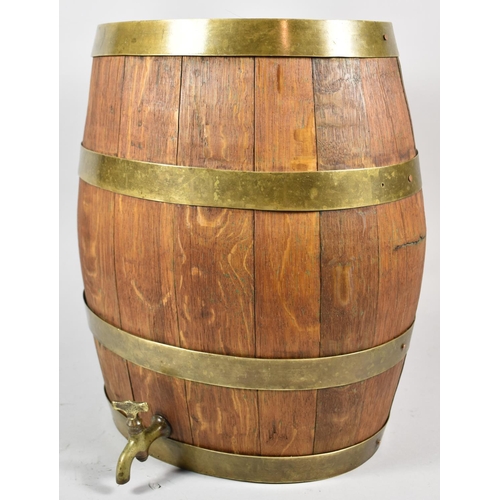 129 - An Oval Coopered Wooden Barrel with Brass Strapwork and Brass Tap, 38cm high