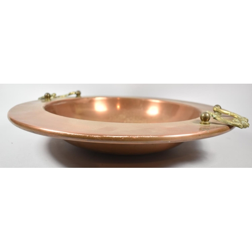 132 - A Circular Copper Bowl with Brass Carrying Handles, 45cm Diameter